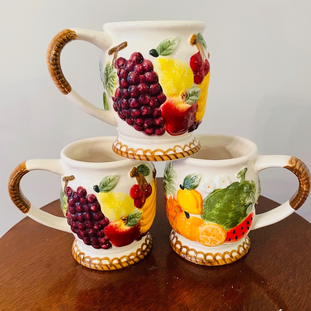 Set of three hand-painted ceramic mugs with raised fruit designs, Vintage mugs